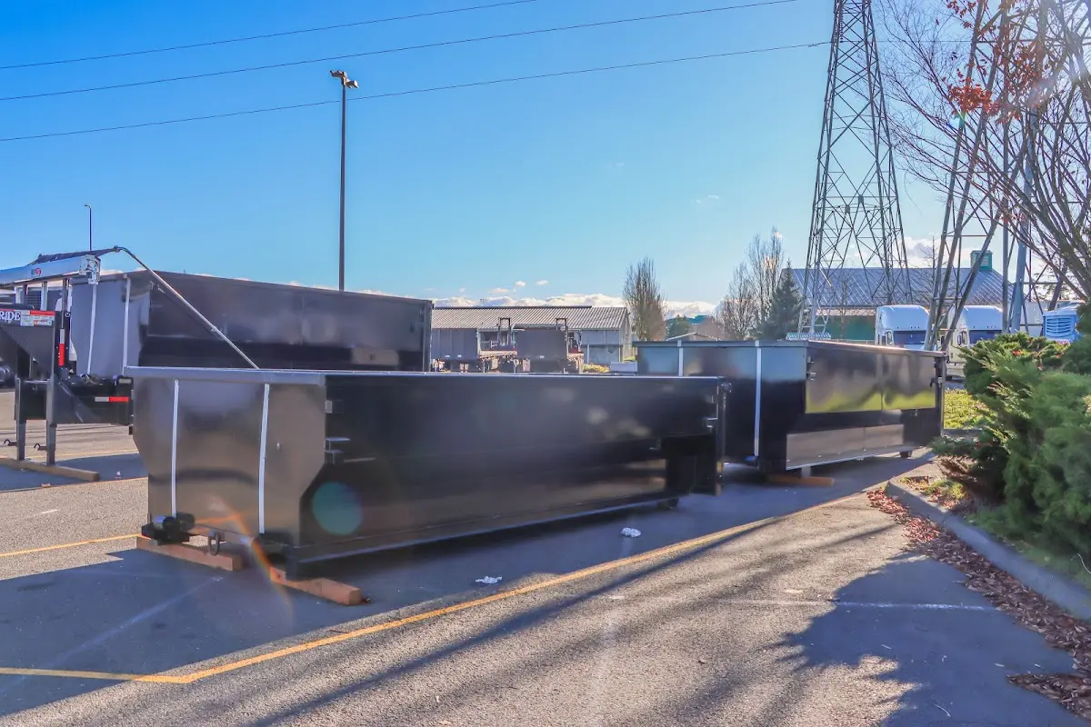 Roll-off dumpster ready for waste disposal at job site for Roofing Dumpster Rental in Stratham